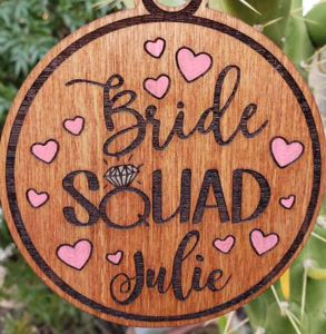 engraved bride squad sign with bride name and hearts